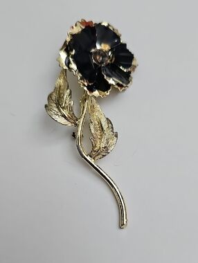 Gold Tone Floral Brooch with Black Enamel Flower
